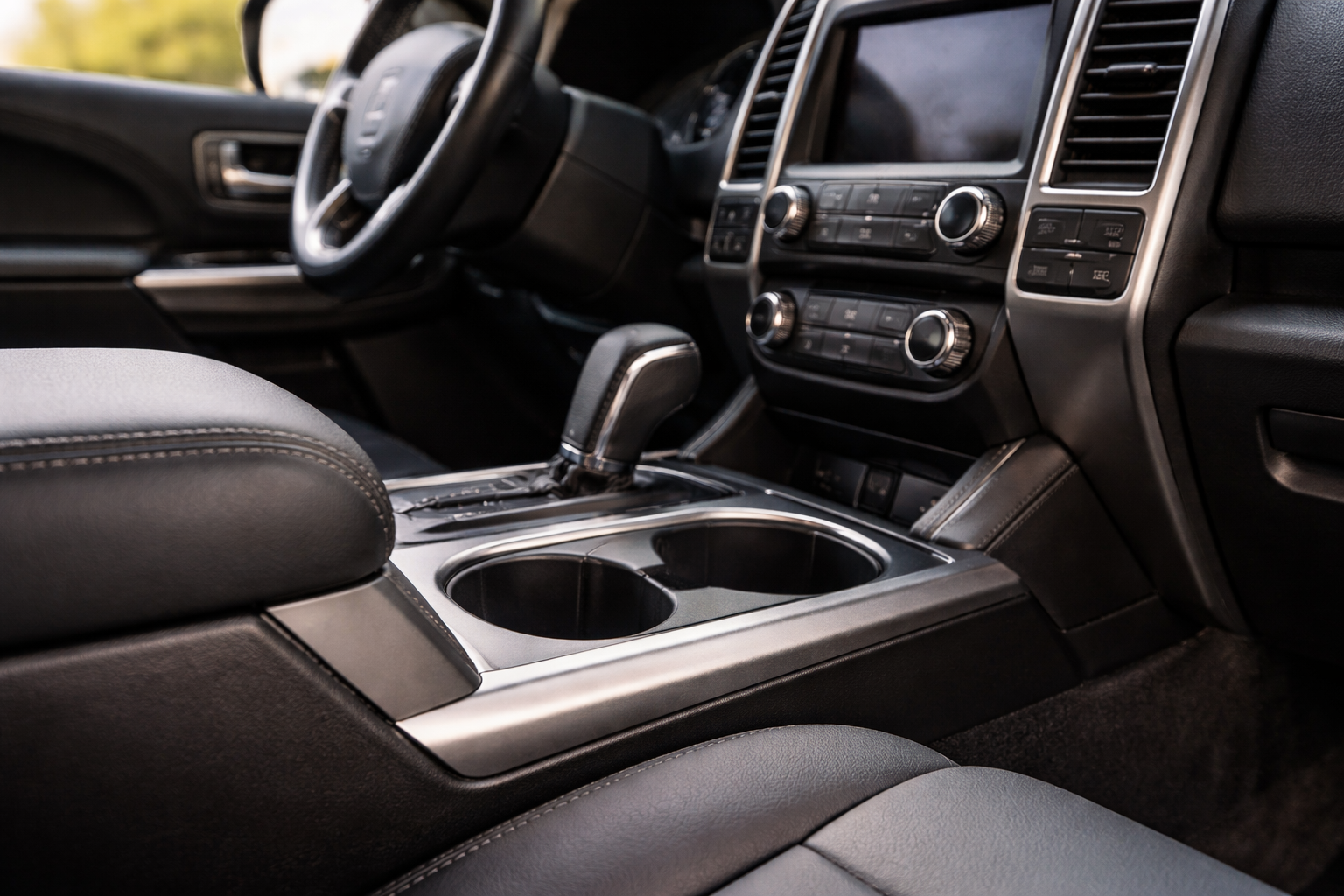 where to mount a gun holster in a car beside seat for quick access