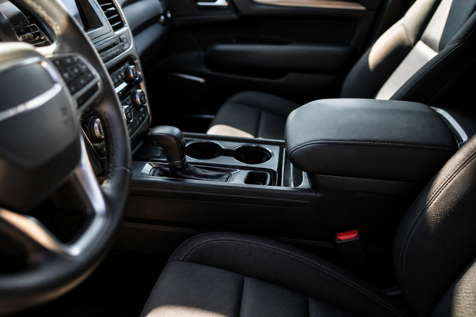 fastest way to access a gun in your car center console area vehicle interior