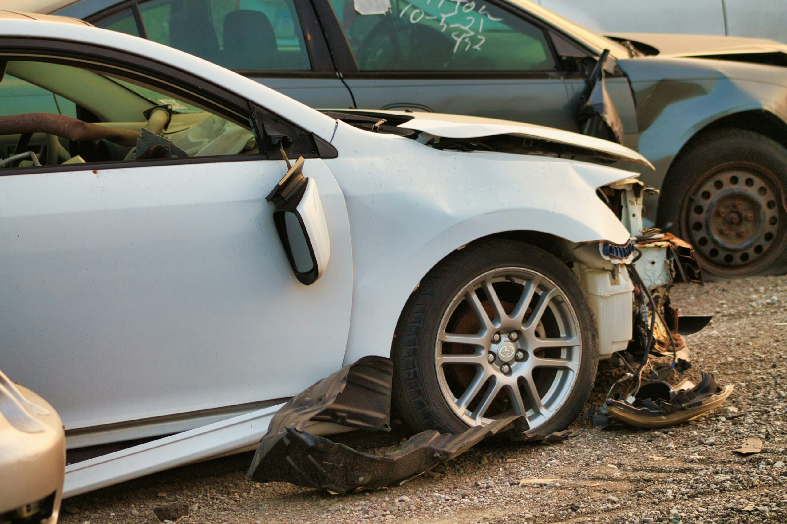 loose firearm during a car accident illustration of unsecured items shifted inside a vehicle after a collision to demonstrate the importance of secure storage