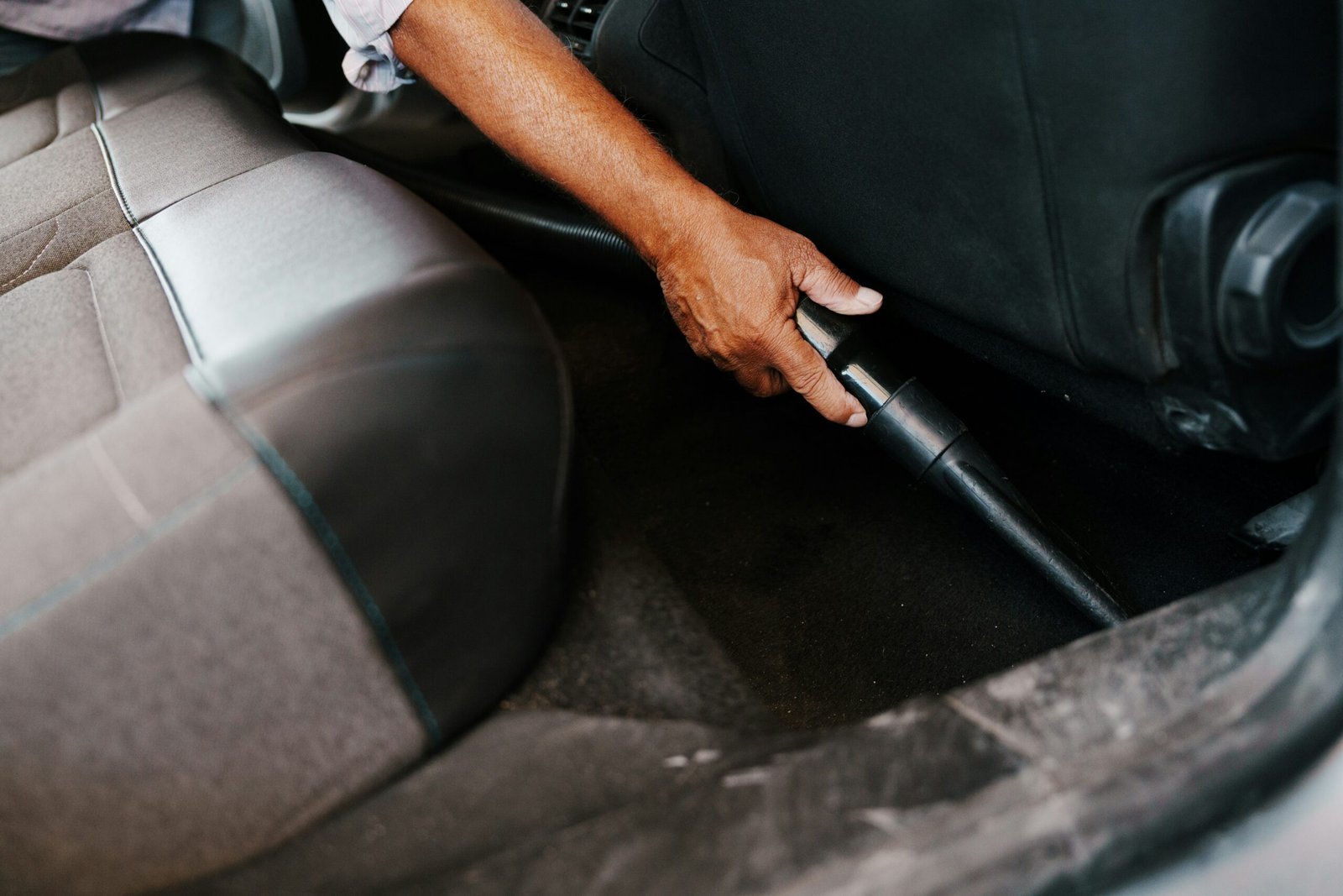 how to clean a vehicle holster mount while detailing the seat and center console area